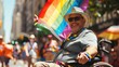 © Fotograf - A person in a wheelchair proudly holds a colorful rainbow flag, symbolizing diversity and inclusion