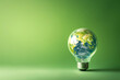 © Sabineyro - Earth inside the light bulb, Green energy in full development Increase in electricity prices on the world market. Concept of energy saving, eco-friendly technologies and sustainable lifestyle. Earth