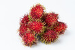 © PixieMe - Red hairy tropical fruits rambutan