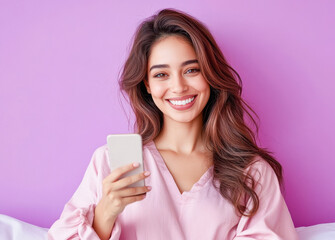 Canvas Print - young indian woman holding smartphone on purple background