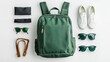 © Business Pics - Green backpack and accessories on white background. Flat lay, top view. fashion and traveling accessories of men on flat lay composition. life style theme.