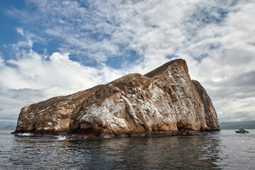 Kicker Rock, also known as León Dormido, is one of the most iconic landmarks in the Galápagos Islands. This stunning rock formation rises dramatically from the ocean, resembling a sleeping lion.