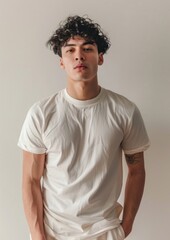 Canvas Print - Cream tshirt mockup Hispanic man clothing apparel.