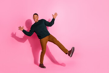 Canvas Print - Full length photo of cheerful positive guy dressed pullover having fun emtpy space isolated pink color background