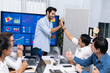 © Summit Art Creations - Analyst team leader celebrate and high five together with his colleague after successful data analysis meeting using FIntech software power with business intelligence or BI dashboard. Prudent