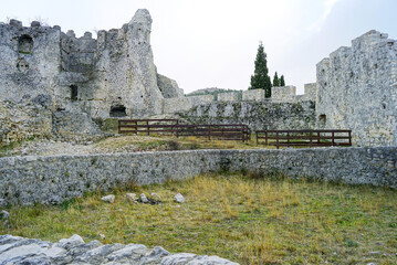 In the Blagaj Fortress: view from the inner courtyard of the ancient fortification to the preserved powerful walls and ruined objects. Sights of the Middle Ages in Bosnia and Herzegovina.