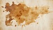 © Vergiliy - Brown ink stain on textured paper background