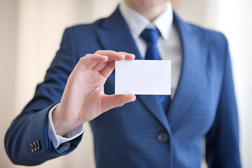 Wall Mural - A Person Holding a Business Card