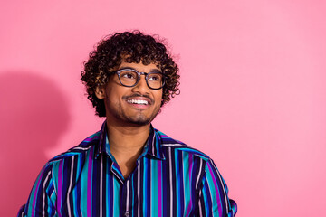 Poster - Portrait of nice young man look empty space wear shirt isolated on pink color background