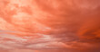 © Yuliia - Beautiful colorful bright sunset sky with orange clouds. Nature sky background.