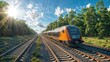 © Artur Lipiński - Modern orange train traveling on multiple railway tracks under bright sunlight through a green forest.