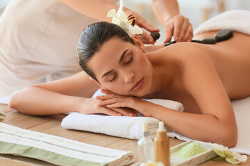 Sticker - Young woman relaxing in spa salon, closeup