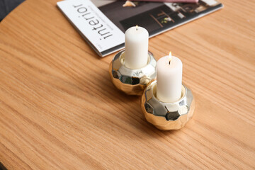 Poster - Stylish candles and magazine on coffee table at home, closeup