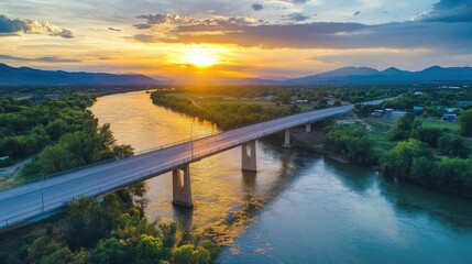 Sticker - Serene Sunset Over River with Bridge and Mountain View