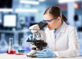 Canvas Print - Biochemical research scientist conducting research in laboratory