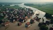 © Phirakhup - Aerial view of a flood-affected village with submerged homes and surrounding landscape.