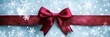 © Brian - red ribbon and bow on winter snowflake background, gift wrap concept
