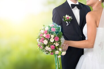 Canvas Print - Happy young wedding couple bride and groomoutdoor