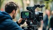 © IMAGINIAC - A Cameraman Filming with a Professional Camera