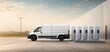 © JP STUDIO LAB - White electric vans plugged in at charging docks, clean energy powering sustainable commercial vehicles, green transport concept