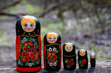 A group of beautiful wooden dolls. Painted Slavic toys.