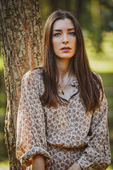 portrait of a woman in the forest in autumm