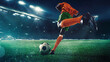 © master1305 - Low angle view on focused man, soccer player in orange uniform, kicking ball with precision against evening sky and fans tribune on background. Concept of sport, tournament, competition, game event