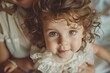 © Vlad - Baby Hair. Closeup of Adorable Baby Held by Mother, Beautiful Background