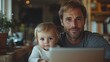 © Feeney - father with small daughter in kitchen distance learning home office ,schooling concept