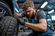 © Sasint - Technician replacing tires in a workshop, ensuring a precise fit for a safe ride, with tools and equipment visible in the background, focusing on professionalism and safety