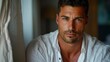 © ifoto - headshot of a muscular and handsome Italian man with short hair, clean shaven, brown eyes, wearing a white linen shirt