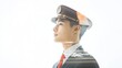 © Валерий Тодаренко - Double exposure image of an Asian male flight attendant in uniform, airport terminals faintly visible on a white background.