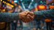 © Anna - Close-up of handshake in busy shopping mall with blurred lights in background.