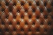 © Stefano - A brown leather texture with a pattern of buttons