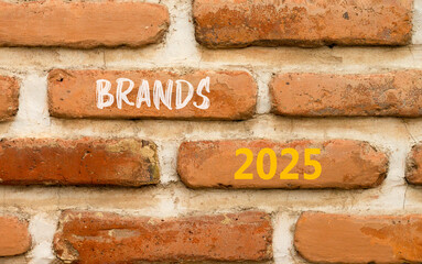 Planning brands 2025 new year symbol. Concept words Brands 2025 on beautiful brown brick wall. Beautiful brown brick wall background. Business brands 2025 new year concept. Copy space.