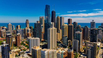 Wall Mural - A group of beautiful skyscrapers and high-rise buildings in the downtown of Chicago. Aerial perspective on the American metropolis on sunny day.