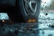 © สมเจตน์ หนูแก้ว - Car tire skidding on wet surface, creating splashes and sparks.