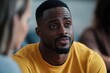 © James - Closeup of black man crying in support group circle and sharing story with therapist supporting, Generative AI
