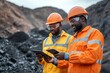 © Anupam - Mid-section portrait of two unrecognizable industrial workers wearing reflective jackets, one of them African, inspecting mineral ore on site outdoors, Generative AI