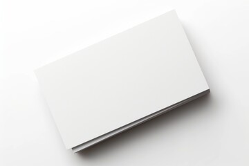 Wall Mural - stack of blank business cards on grey background: high-resolution mockup template with white paper f