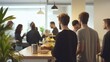 © Naturalis - Diverse Group of People Enjoying a Communal Meal in a Cozy Office Space