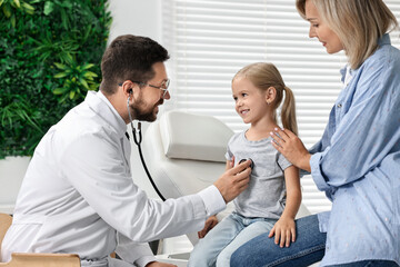 Poster - Doctor examining little girl with stethoscope and her mother in hospital