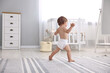 © New Africa - Cute little child in diaper at home