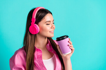 Sticker - Photo portrait of attractive teen woman headphones drink coffee paper cup dressed stylish pink clothes cyan on blue color background