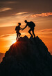 © Aisyaqilumar - Silhouette of a man helping a woman reach a mountain peak, symbolizing help and support in the silhouette style.