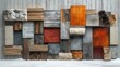 © zulie - A wall of different materials in a variety of colors and textures, including wood, stone, fur, and metal.
