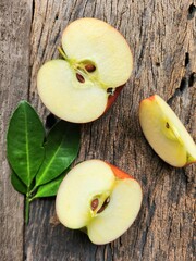 Ripe apple on wood background