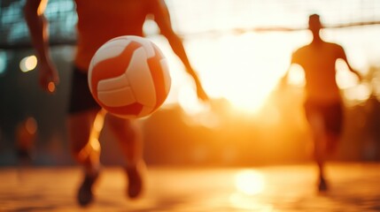 A close-up dynamic shot of a soccer ball in motion, with player silhouettes in the background on a field, illustrating energy, speed, and competition at sunset.