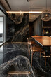 © pijav4uk - Elegant dining area with stylish black marble floor and wall decor