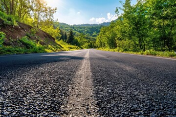 Mountain road on sunny summer day